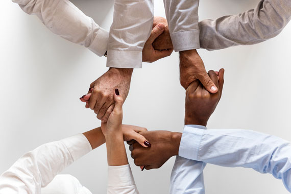 business-hands-joined-together-teamwork12